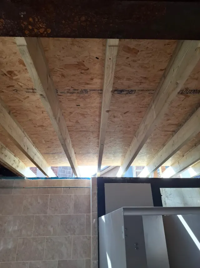 New OSB decking complete across the roof structure